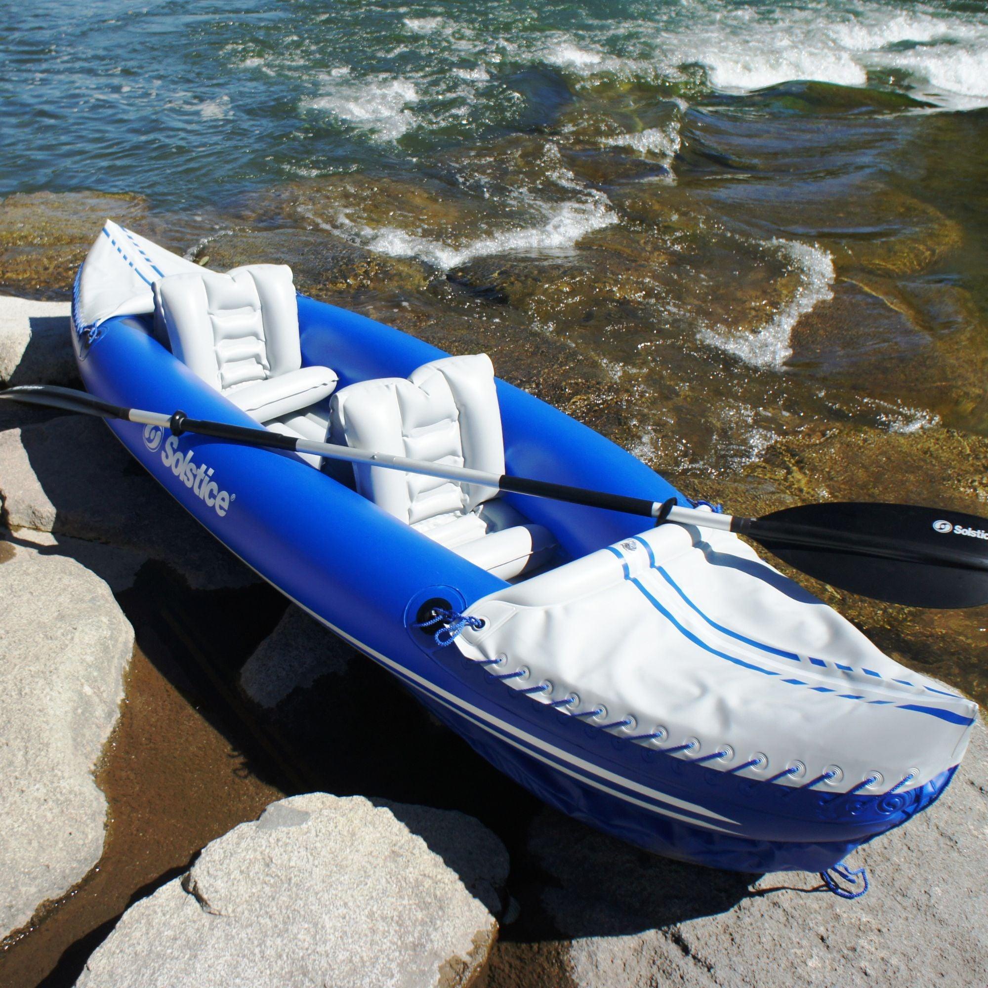 Solstice Rogue inflatable kayak with fore and aft spray skirts and a screw-style drain valve